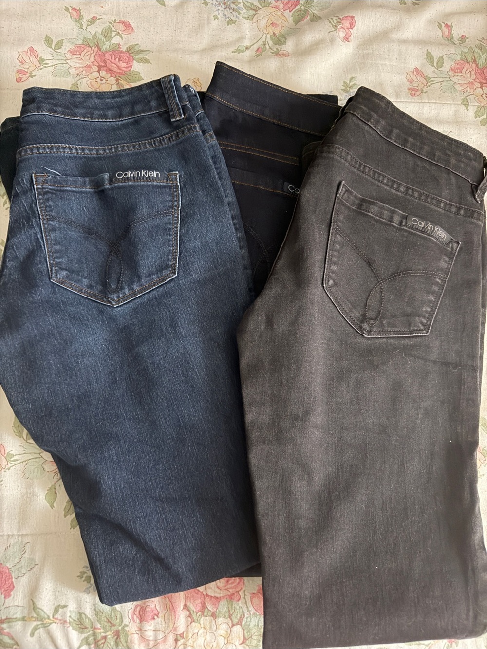Calvin Klein Three-Pack Slim Straight Jeans in Dark Blue, Navy, and Black size 2